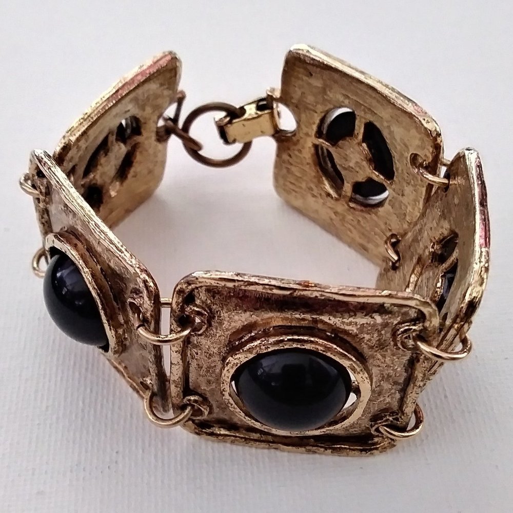 Chunky Gold Tone Bracelet with Black Round Cabochons